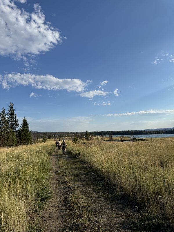 Cyclists on a lakeside trail